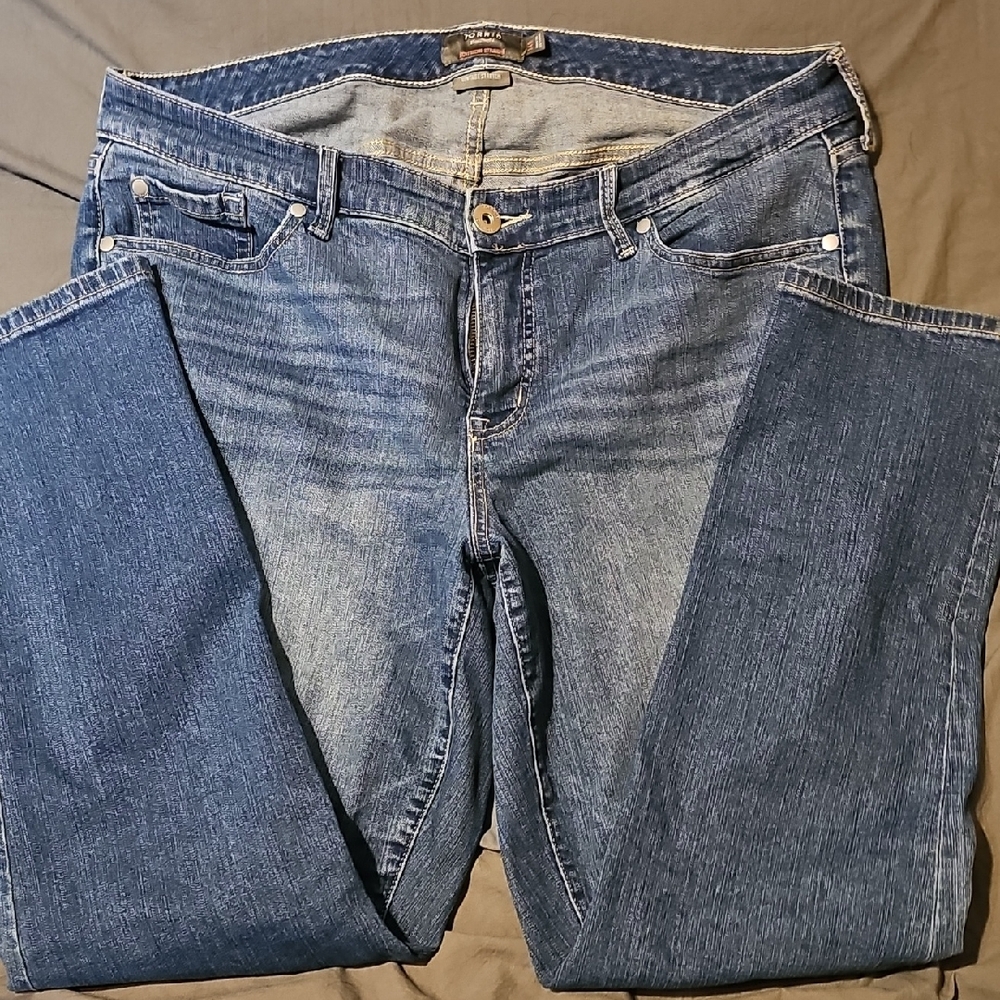 Torrid Blue Straight Leg Jeans with Distressed Look